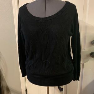 Knit sweater with heart details.